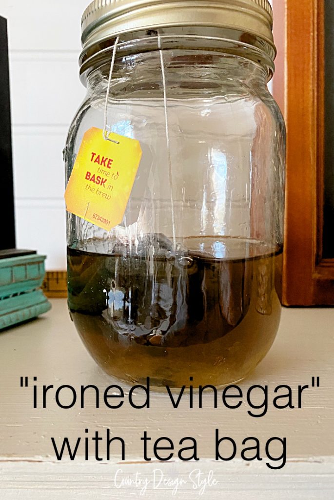 mason jar with ironed vinegar and teabag