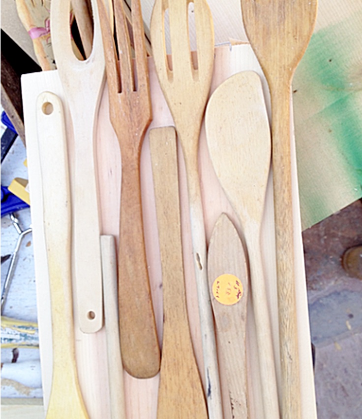 wood kitchen scrap utensils laid out