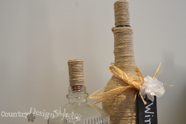 wine bottle and cork wrapped with twine http://countrydesignstyle.com