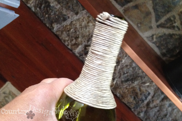 wrapping wine bottle #twinewrapping https://countrydesignstyle.com