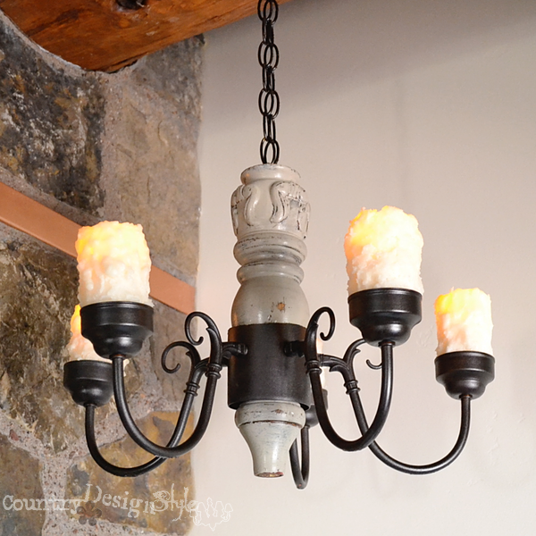 hanging in place with #batterycandles http://countrydesignstyle.com #DIY #chandelier #candlechandelier