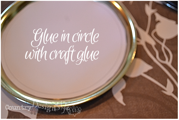 Glue in paper Chandelier Ring Art http://countrydesignstyle.com #art #easydiy #repurposing