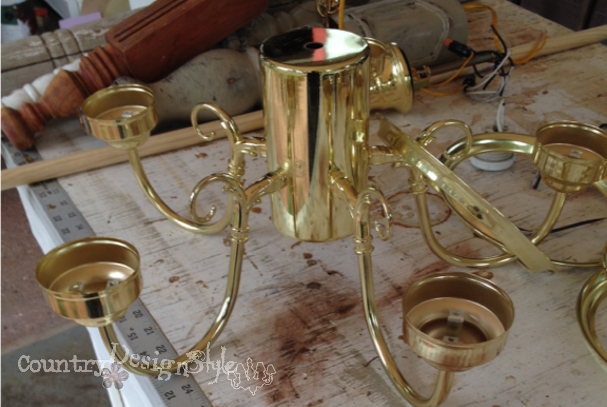 stripped chandelier http://countrydesignstyle.com #DIY #chandelier #candlechandelier