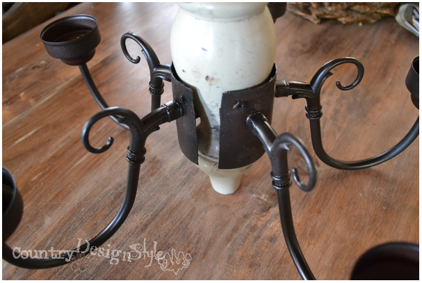 painted and screwed into place https://countrydesignstyle.com #DIY #chandelier #candlechandelier