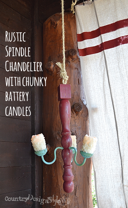 rustic chandelier made with spindle http://countrydesignstyle.com #DIY #chandelier #candlechandelier
