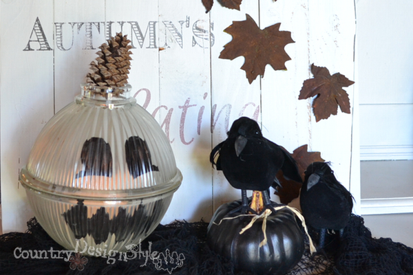 pumpkin from chandelier globe http://countrydesignstyle.com #pumpkin #fall
