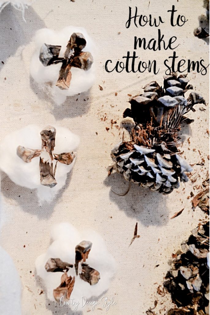 cotton balls with pine cone scale glued around in a circle