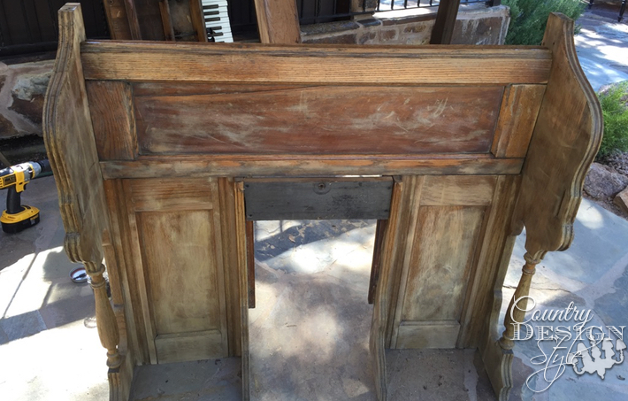 Pieces of an old organ turning into a faux mantel. | countrydesignstyle.com