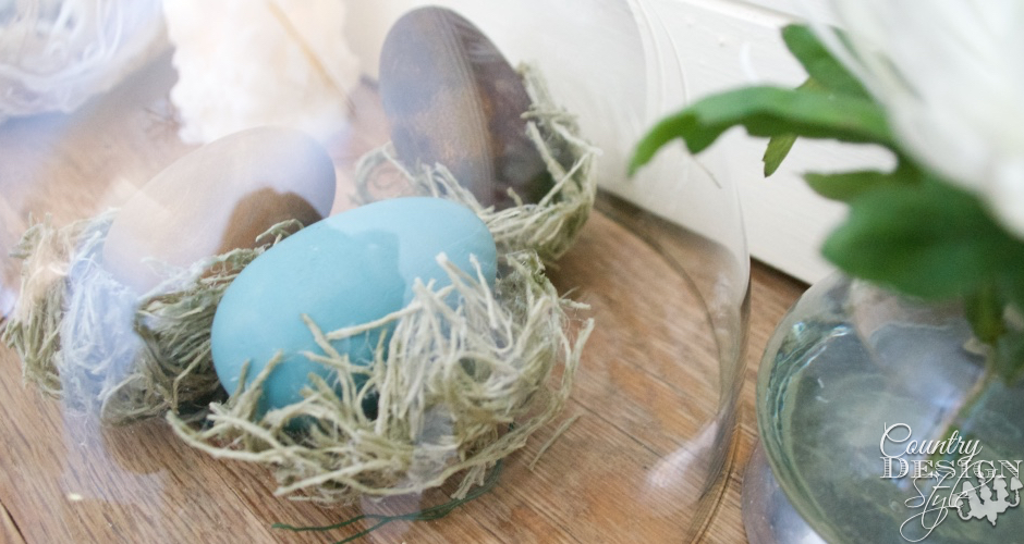 Easter Mantel with eggs under glass | Country Design Style | countrydesignstyle.com