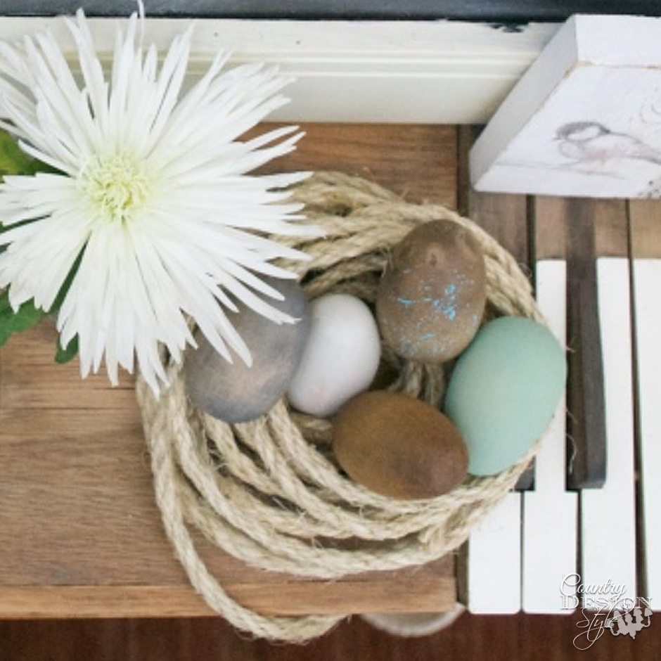 Eggs in rope nest on Easter Mantel | Country Design Style | countrydesignstyle.com