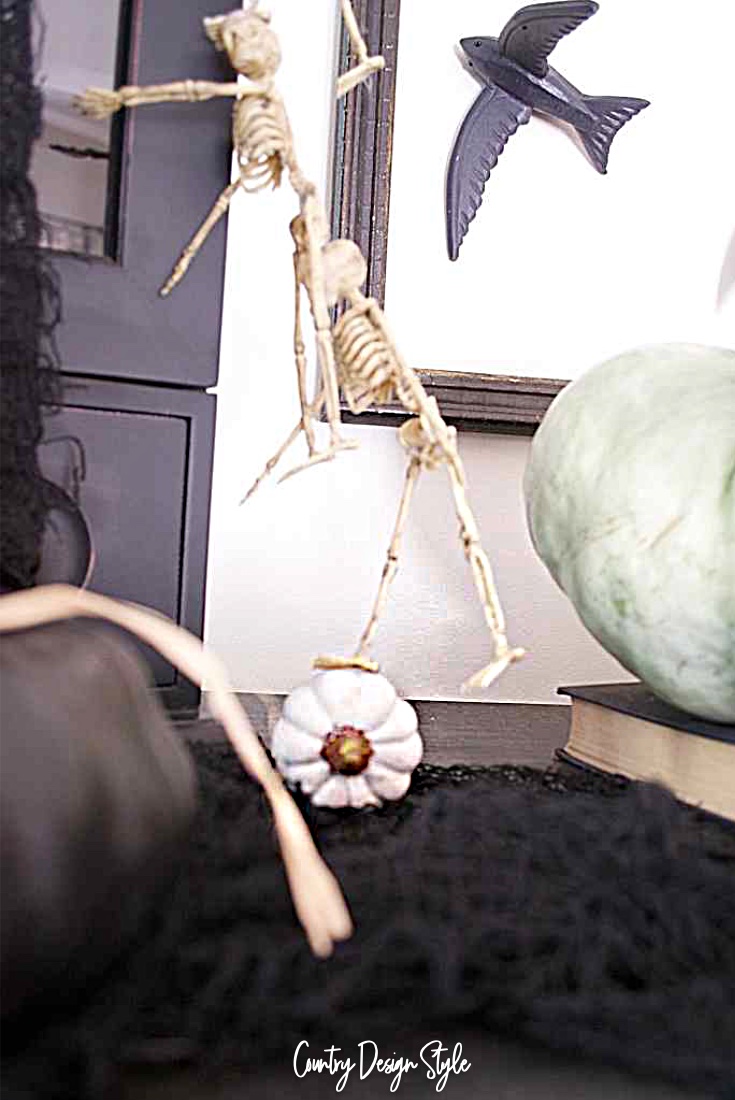 Funny Halloween Display skeleton on pumpkin