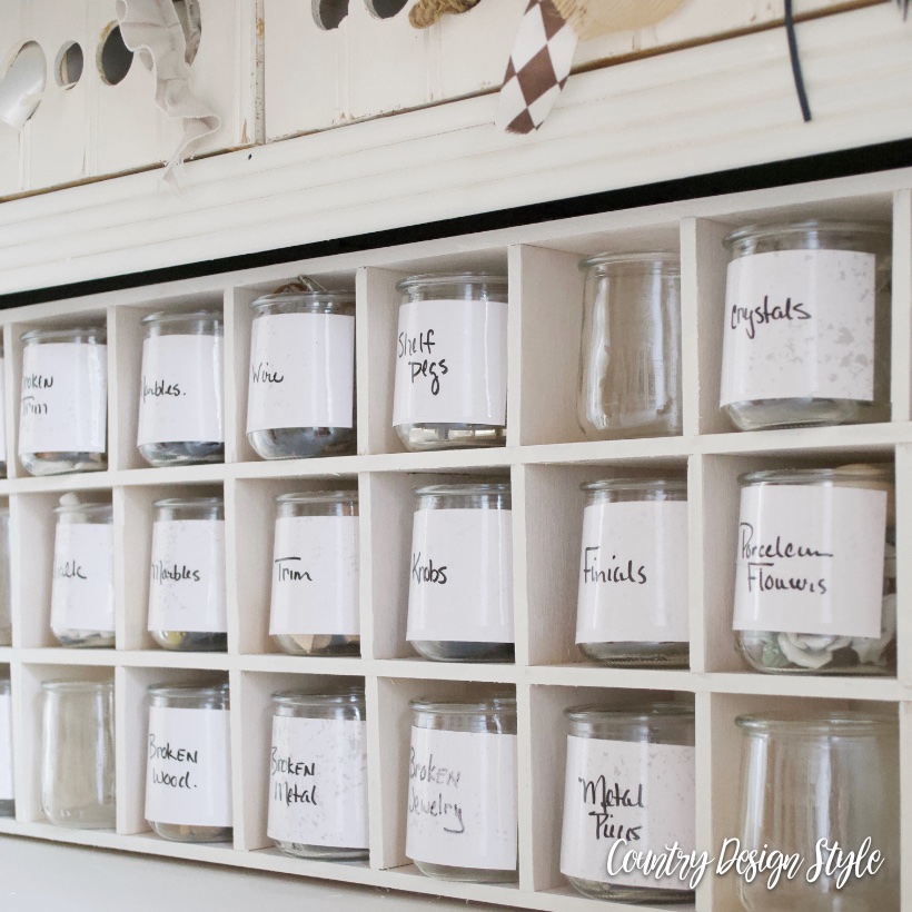 Cubbies filled with jars and labeled