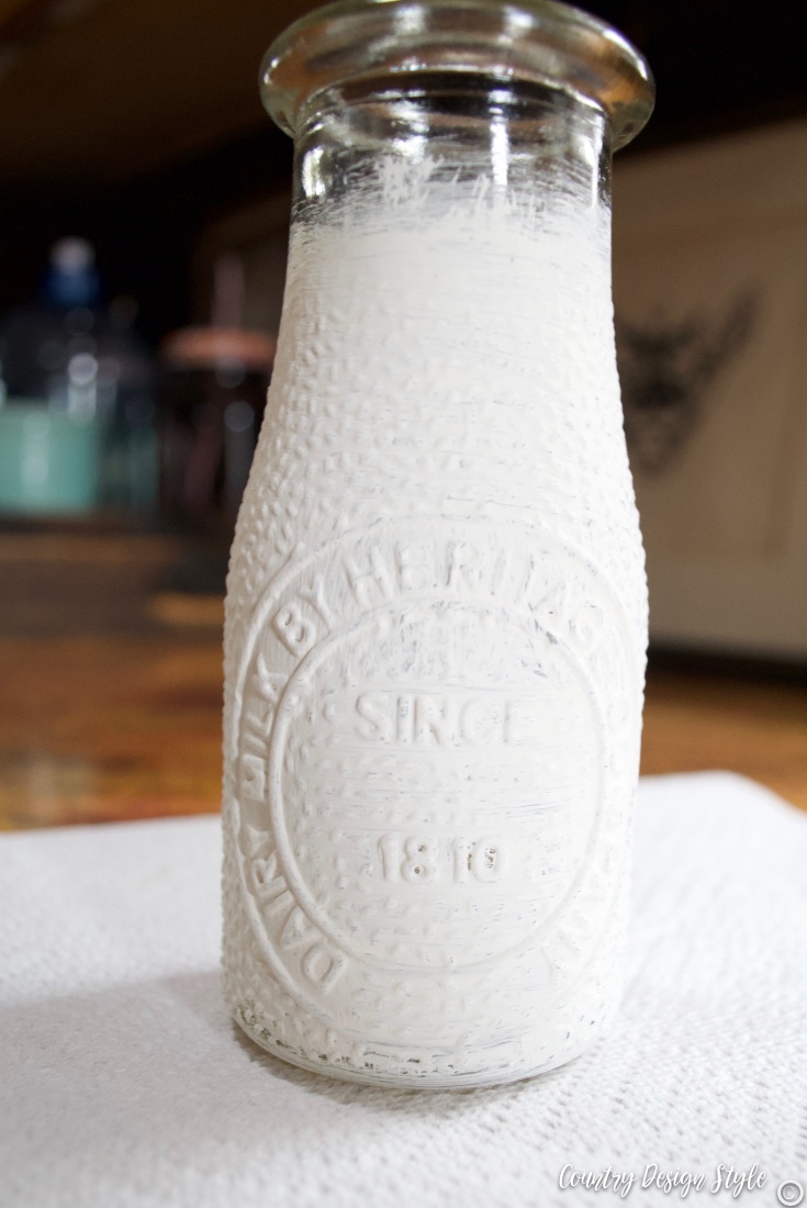 Rustic wedding centerpiece milk bottle painted 
