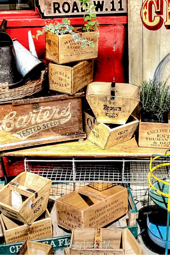 wood crates and basket on display for sale
