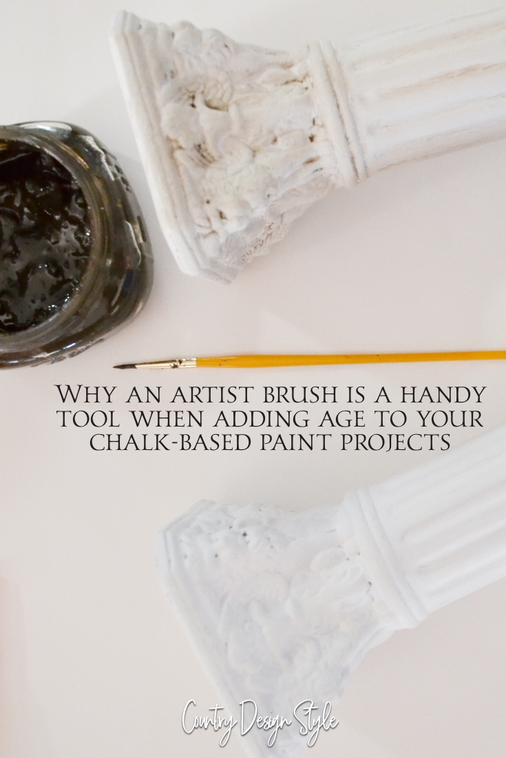 Using an artist brush to age paint