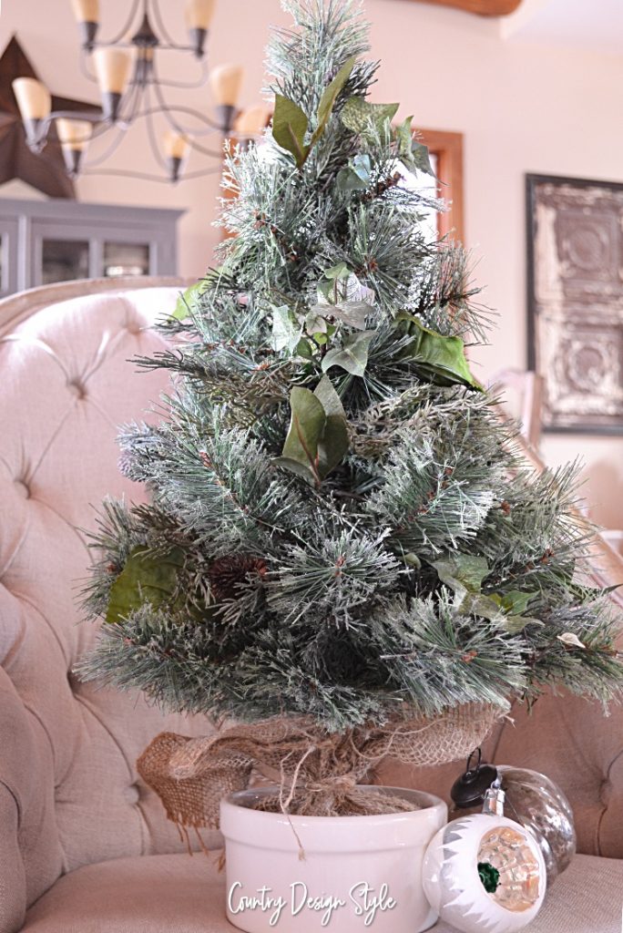 Upcycled tree sitting in chair