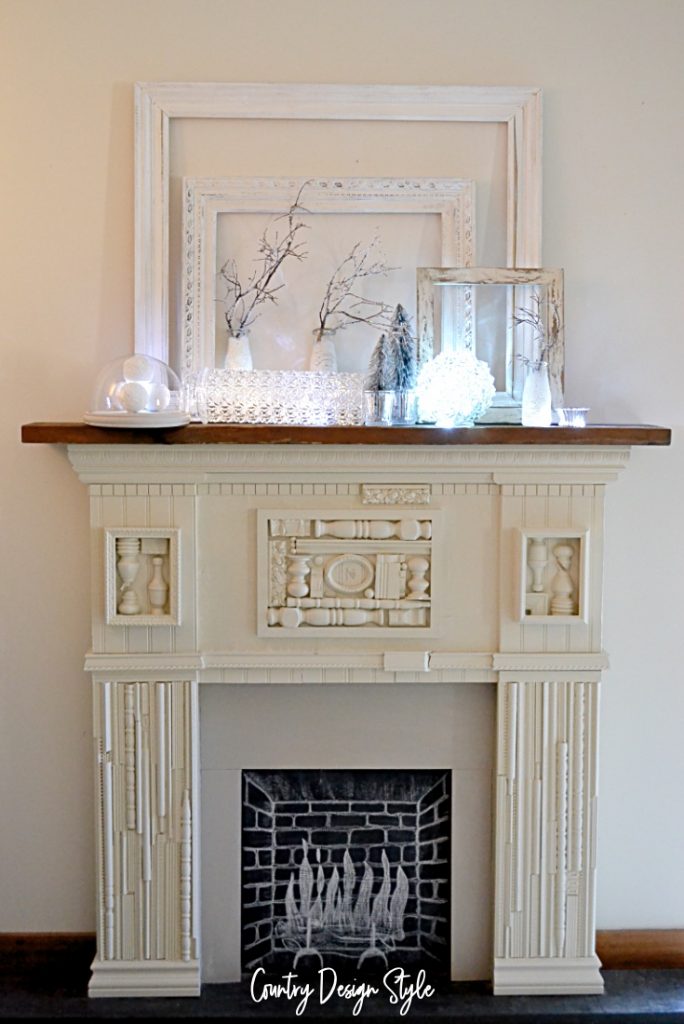 battery operated lights on mantel vignette