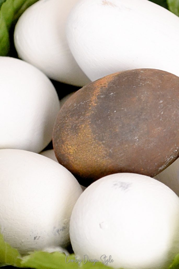 White eggs and one brown