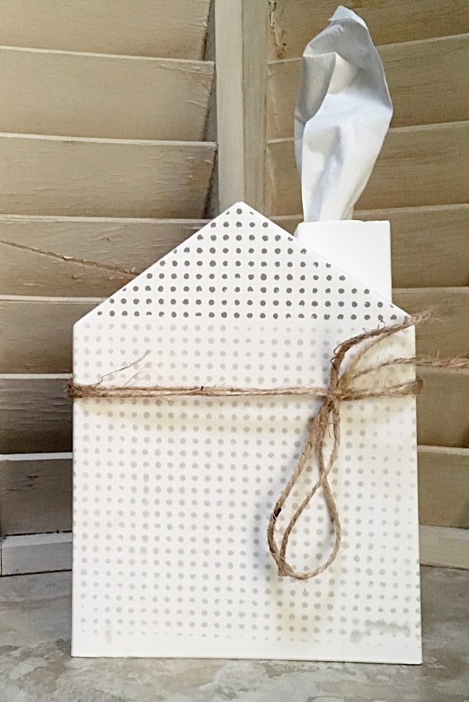 white tissue cover with farmhouse dot style and twine. 