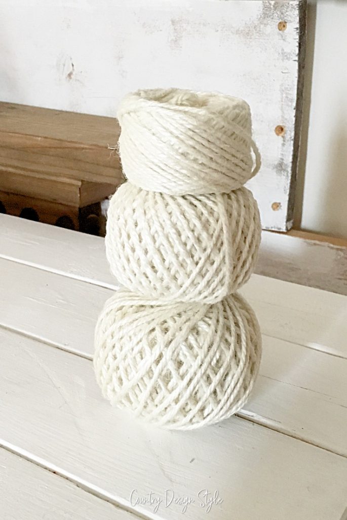 yarn balls stacked like a snowman