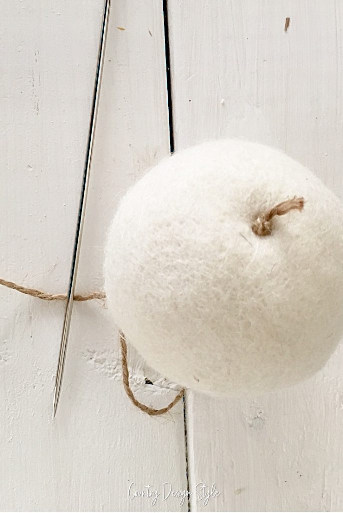 twine through wool dryer ball
