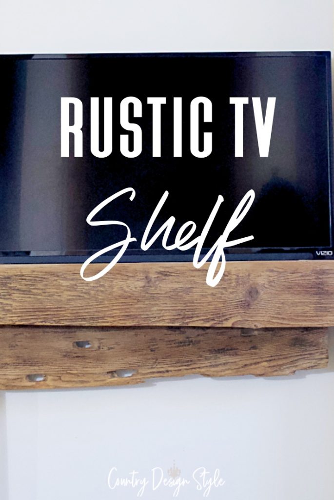 TV with barn wood shelf