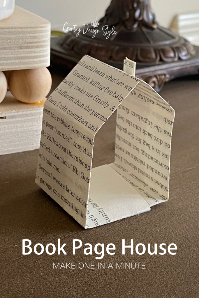 Book page folded into a simple house shape
