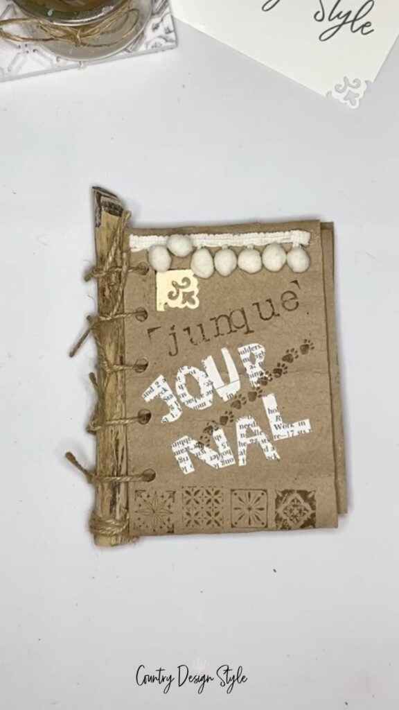 Junque Journal made using toilet paper tubes. 