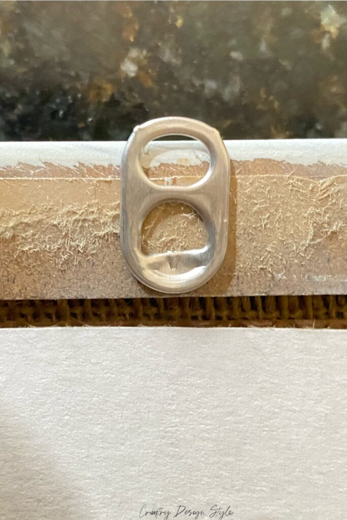 soda tabs to hang frames